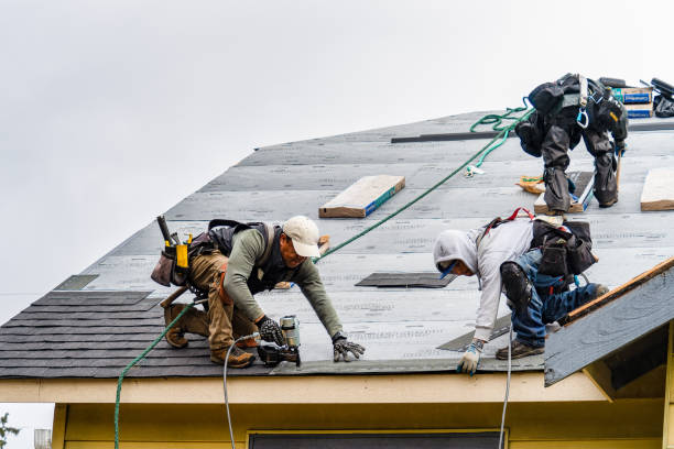 Professional Gutter Installation technician working in Butler, MO